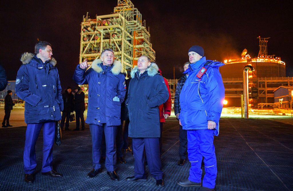 Russian President Vladimir Putin (C), Novatek CEO Leonid Mikhelson (2nd L), and Russian energy minister Alexander Novak (L), visits facilities of the Yamal LNG plant in Sabetta, Yamal Peninsula Dec. 8, 2017. (Alexey Druzhinin/AFP/Getty Images)