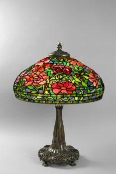 Louis Comfort Tiffany‘s "Peony" lamp, which used his special invention of iridescent glass. (Macklowe Gallery)