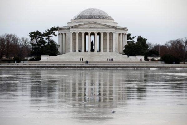 The Jefferson Memorial is reflected in ice during record cold in Washington, U.S., Jan. 3, 2018. (Reuters/Joshua Roberts)