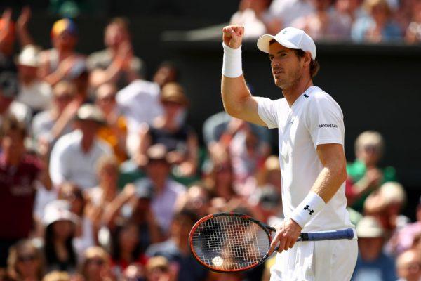 Andy Murray of Great Britain celebrates winning the third set during the Gentlemen's Singles quarter final match against Sam Querrey of The United States on day nine of the Wimbledon Lawn Tennis Championships at the All England Lawn Tennis and Croquet Club on July 12, 2017 in London. (Clive Brunskill/Getty Images)