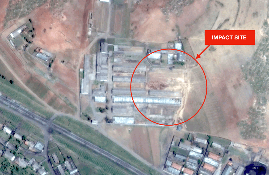 The report in The Diplomat references satellite images (not the ones displayed here) that appear to show an impact crater that has apparently since been filled in. The report also draws attention to seeming structural damage to one of the buildings. (Google Maps)