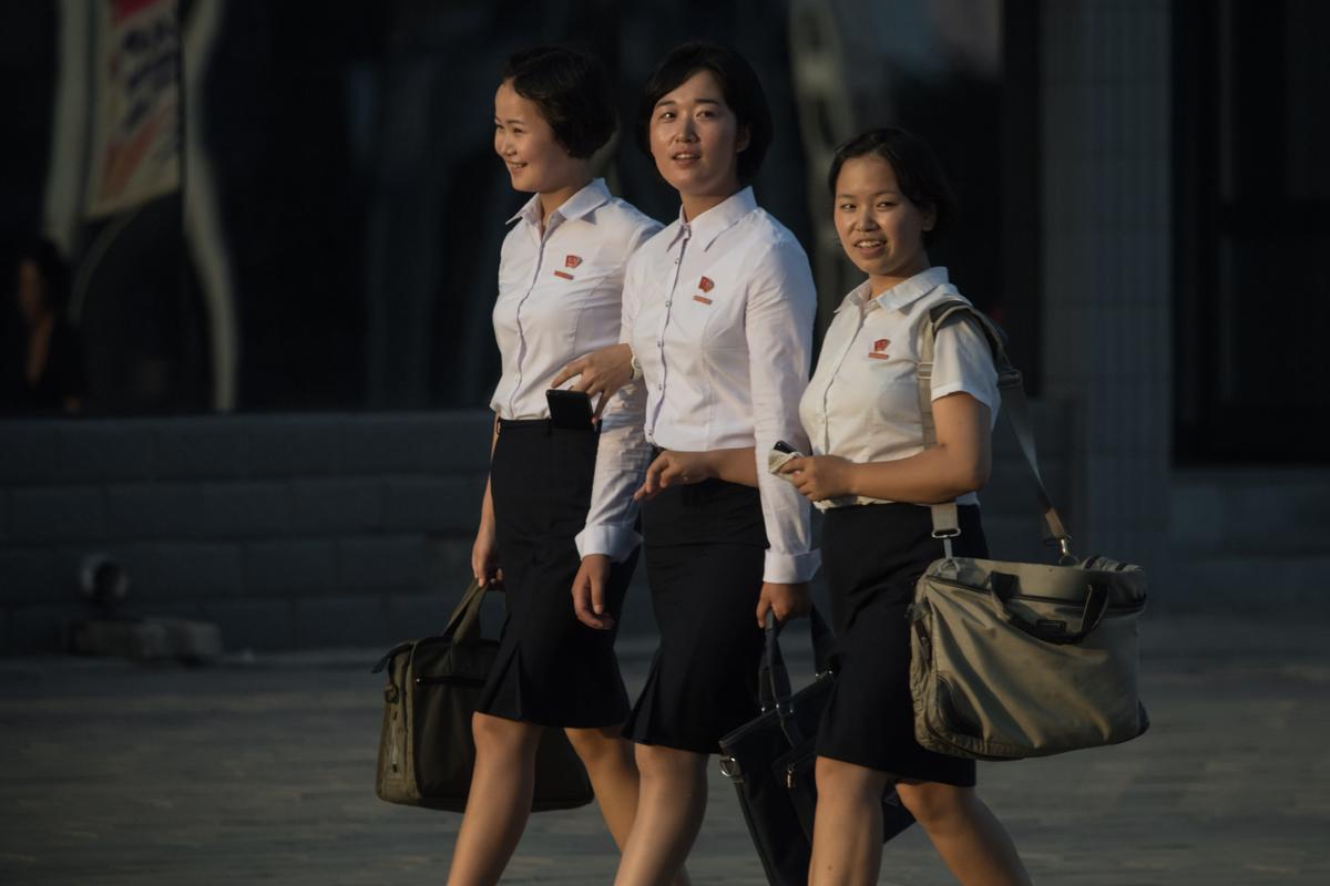 A photo taken on July 24, 2017, shows a group of university students walking on a street in Pyongyang. (ED JONES/AFP/Getty Images)
