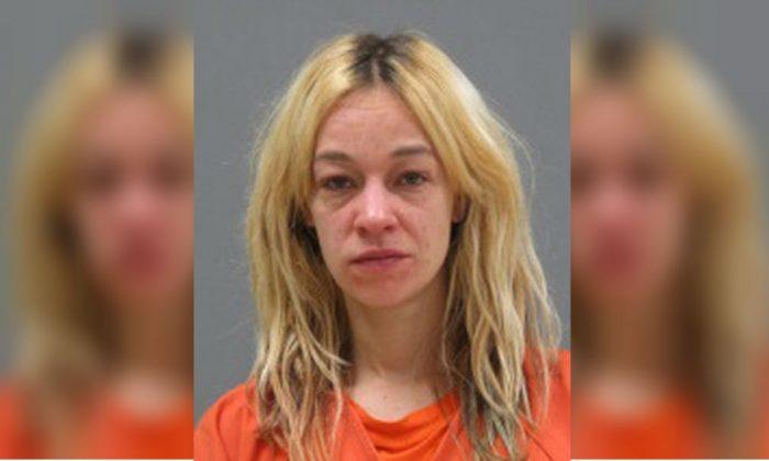 Police: Minnesota Woman Kicked Out Windshield of Uber Driver