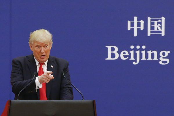 U.S. President Donald Trump speaks to Chinese business leaders on November 9, 2017, in Beijing, China during his 10-day trip to Asia. Trump’s focus on boosting U.S. domestic economy and national strength is a logical response to growing challenges posed by China, said Yan Xuetong, one of China’s top foreign policy scholars. (Thomas Peter-Pool/Getty Images)