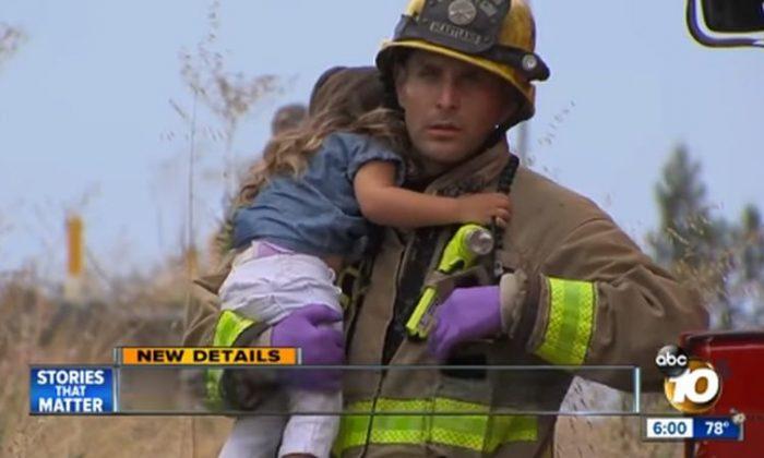 Firefighter Comforts Little Girl After Crash, Goes Viral