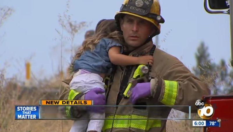Firefighter Called a Hero for Comforting Little Girl After Crash