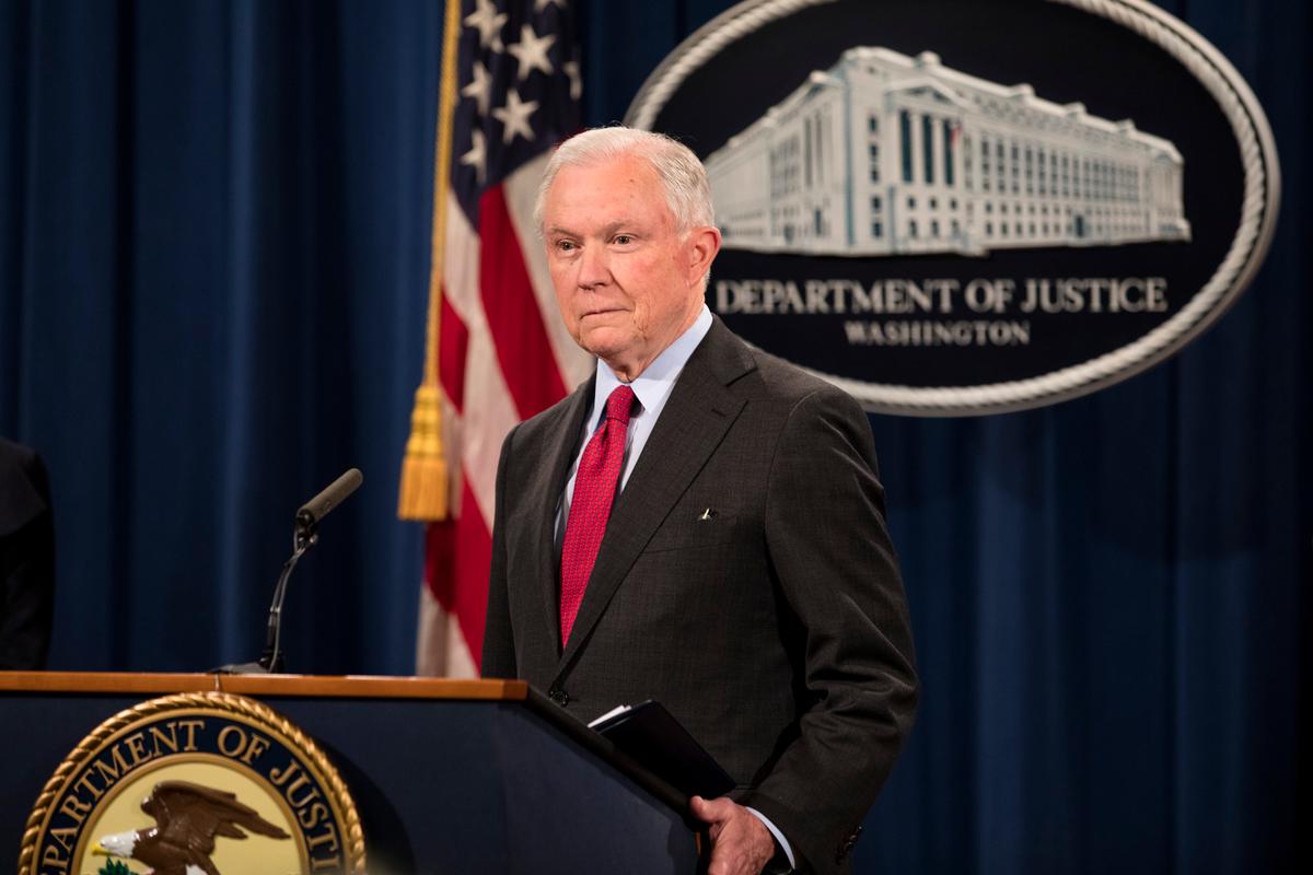 Attorney General Jeff Sessions speaks at a press conference at the Justice Department in Washington on Dec. 15, 2017. The Justice Department has multiple ongoing investigations on politicians and high-profile officials. (Samira Bouaou/The Epoch Times)