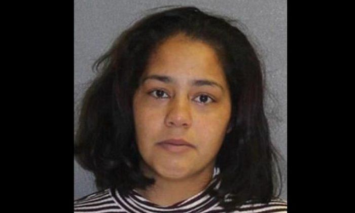 Florida Woman Allegedly Left Young Kids Home Alone With a Shotgun, 3 Dogs