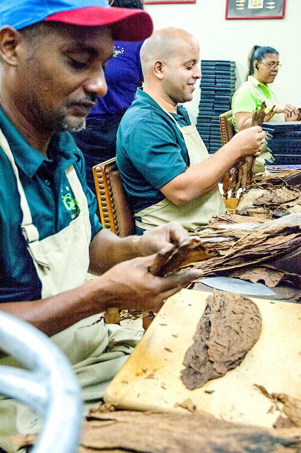 Expert cigar rollers at work at Graycliff Hotel in Nassau. (Carole Jobin)