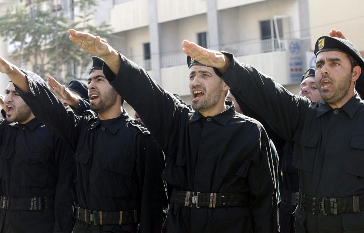 Hezbollah terrorists attend a ceremony on 'Martyr's Day' on Nov. 11, 2010. (MAHMOUD ZAYAT/AFP/Getty Images)