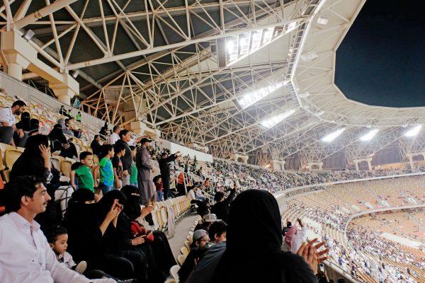 Saudi women watch the soccer match between Al-Ahli against Al-Batin at the King Abdullah Sports City in Jeddah, Saudi Arabia on Jan. 12, 2018. (Reem Baeshen/Reuters)