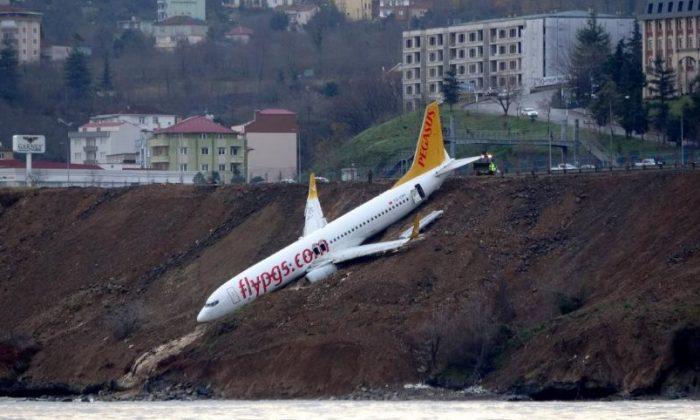 Plane Skids Off Turkish Runway and Hangs Off Slope Towards Sea
