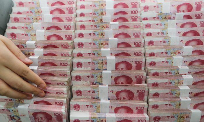 After Embezzling Cash, Corrupt Chinese Officials Scramble to Hide It