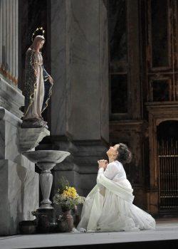 Sonya Yoncheva as Tosca, asking for divine help. (Ken Howard/Metropolitan Opera)