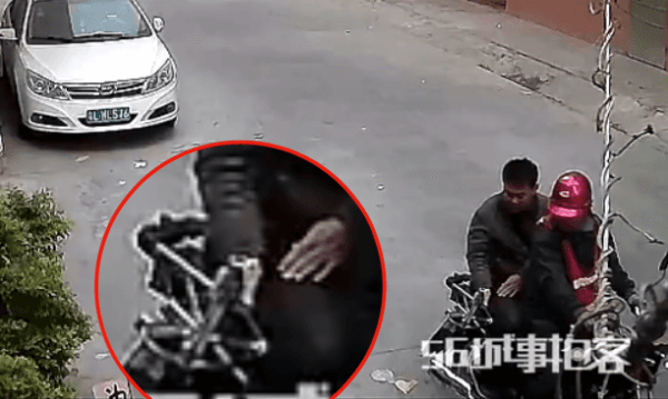 Dog-snatchers in China using poisonous darts and a crossbow to kill and steal dogs. (Screengrab viaLiveLeak.com)