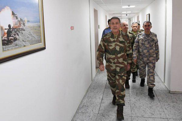 Turkey's Chief of the General Staff Hulusi Akar flanked by his top generals arrives for a meeting at the armed forces' headquarters in Ankara, Turkey January 20, 2018. Turkish (Military/Handout via Reuters)