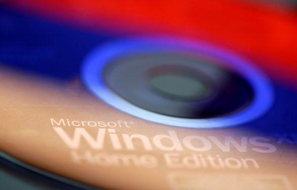 The Russian flag is reflected on the Microsoft Windows Installation CD in this illustration taken Jan. 12, 2018. (Reuters/Dado Ruvic)