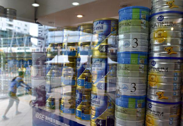 A shop window displaying tins of baby milk formula in Sydney, Australia, on February 16, 2016. (Saeed Khan/AFP/Getty Images)
