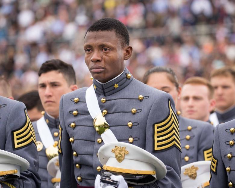 2nd Lt. Alix Schoelcher Idrache cries during the United States Military Academy West Point Graduation, May 23, 2016. (U.S. Army Staff Sgt. Vito T. Bryant)