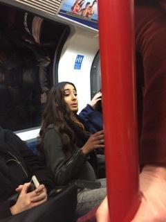 Police have identified this woman as a person of interest after a mother-of-two was racially abused and assaulted on a London Tube train. (British Transport Police)