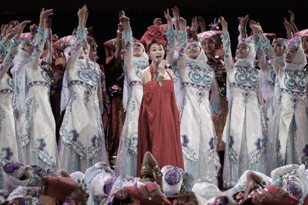 Song Zuying (center) performs during a gala to celebrate the 90th anniversary of the founding of the Chinese Communist Party in the Great Hall of the People on June 28, 2011. (Feng Li/Getty Images)