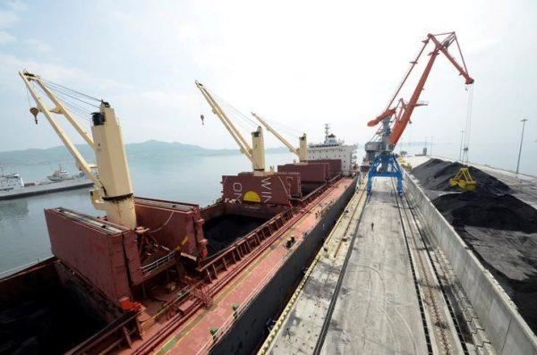 A cargo ship is loaded with coal during the opening ceremony of a new dock at the North Korean port of Rajin July 18, 2014. (Reuters/Yuri Maltsev/File Photo)