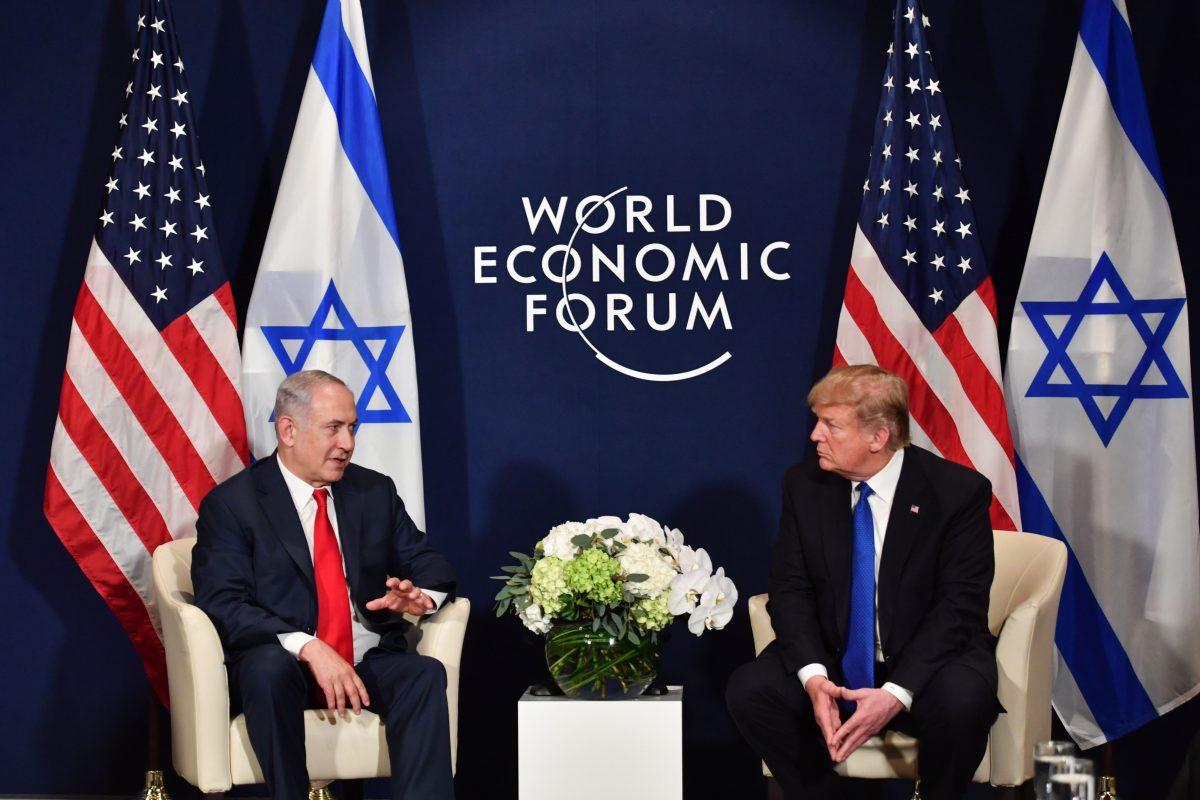 President Trump speaks with Israel's Prime Minister Benjamin Netanyahu during a bilateral meeting on the sidelines of the WEF in Davos, on Jan. 25, 2018. (NICHOLAS KAMM/AFP/Getty Images)