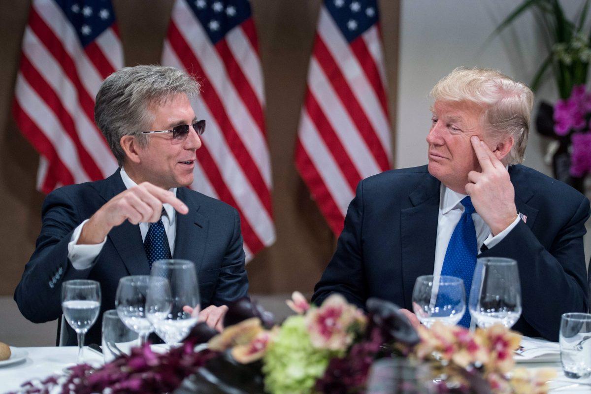 President Trump listens to SAP CEO Bill McDermott during a working dinner with European business leaders at the WEF in Davos, on Jan. 25, 2018. (NICHOLAS KAMM/AFP/Getty Images)
