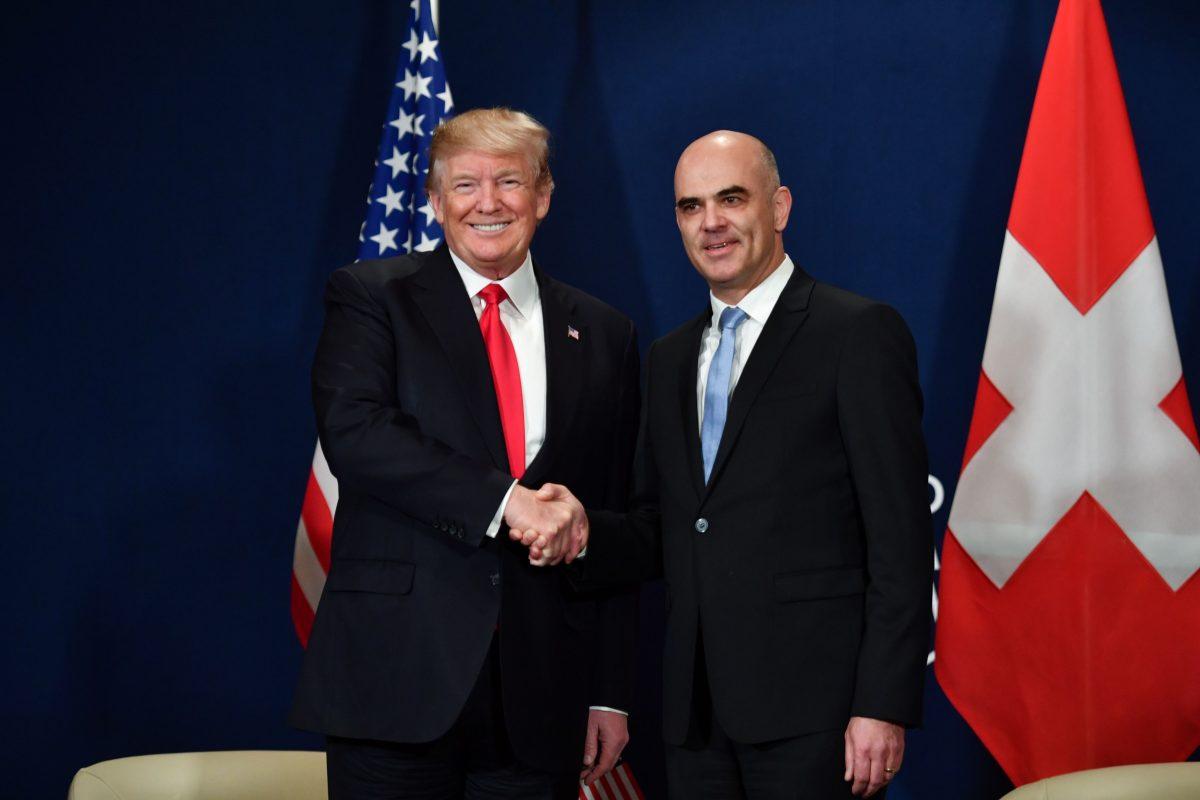 President Trump shakes hands with Swiss President Alain Berset during a bilateral meeting at the WEF in Davos, on Jan. 26, 2018. (NICHOLAS KAMM/AFP/Getty Images)
