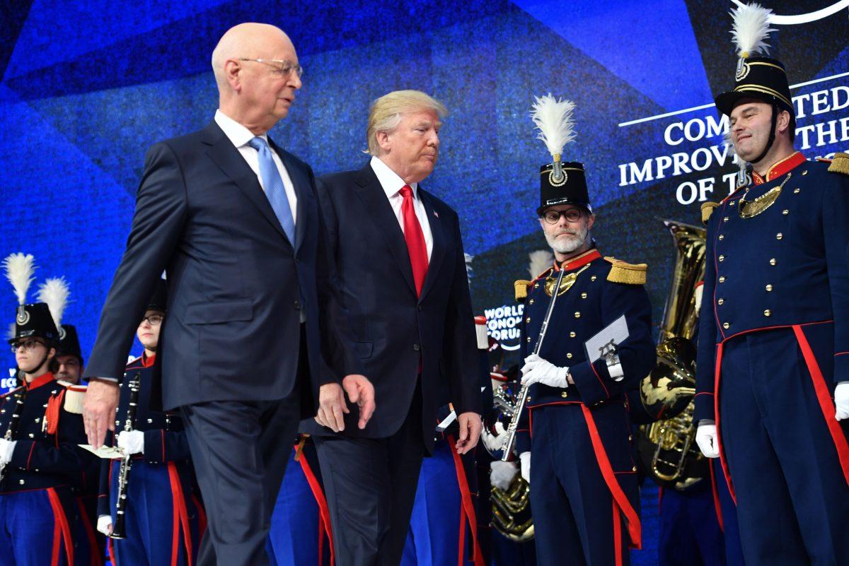 President Trump and Klaus Schwab, WEF founder and executive chairman, arrive to address the WEF annual meeting in Davos, on Jan. 26, 2018. (NICHOLAS KAMM/AFP/Getty Images)