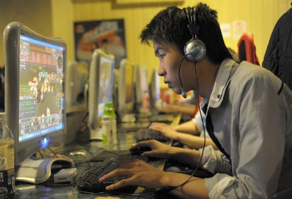 A man plays online games at an internet cafe in Beijing on February 27, 2010. (Liu Jin/AFP/Getty Images)