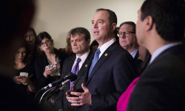 Rep. Adam Schiff (D-Calif.) and members of the House Intelligence Committee talk to media after voting to release the memo, on Capitol Hill, Washington, Jan. 29, 2018. (Samira Bouaou/The Epoch Times)