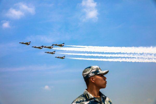 China's Bayi Aerobatic Team performing in the sky during the Chinese People's Liberation Army Air Force Aviation Open Day in Changchun City in northeastern China on Aug. 13, 2017. (STR/AFP/Getty Images)