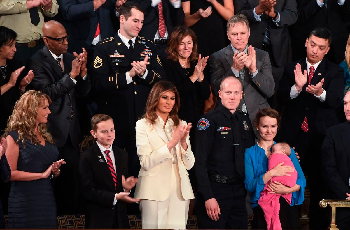 First Lady Melania Trump claps as President Donald Trump delivers the State of the Union address at the US Capitol in Washington, DC, on Jan. 30, 2018. (SAUL LOEB/AFP/Getty Images)