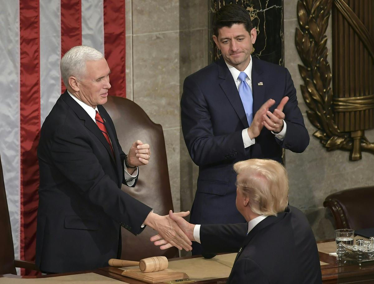 President Donald Trump shakes hands with US Vice President Mike Pence and Speaker of the House Paul Ryan following his State of the Union address at the US Capitol on Jan. 30, 2018.<br/>(MANDEL NGAN/AFP/Getty Images)