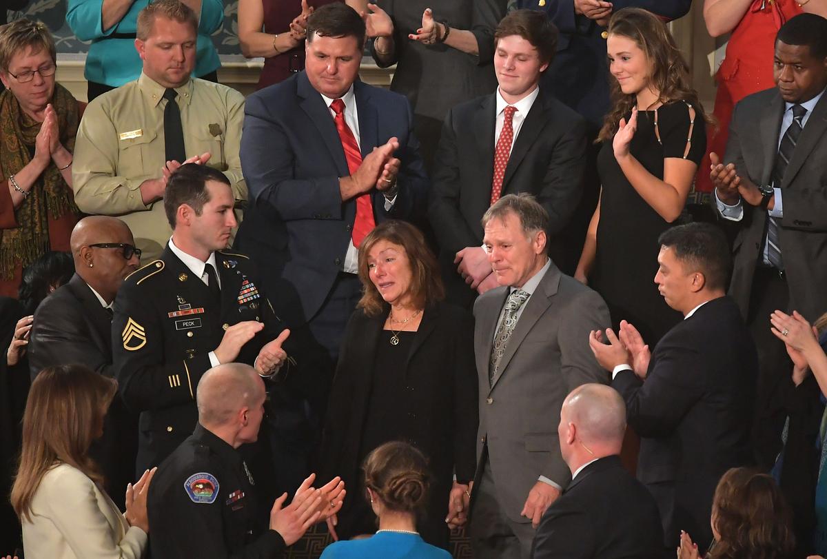 Fred and Cindy Warmbier react as they are recognized during the State of the Union address at the US Capitol in Washington on Jan. 30, 2018. (MANDEL NGAN/AFP/Getty Images)