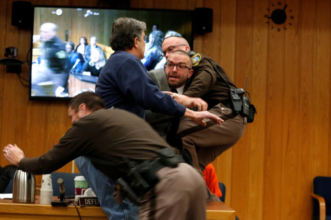 Father of Molested Girls Lunges at Disgraced USA Gymnastics Doctor in Court