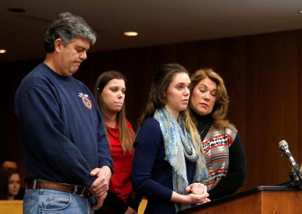 Madison Rae Margraves gives her impact statement as her parents and sister Lauren listen during the sentencing hearing in the Eaton County Court in Charlotte, Michigan, U.S., February 2, 2018. (Reuters/Rebecca Cook)