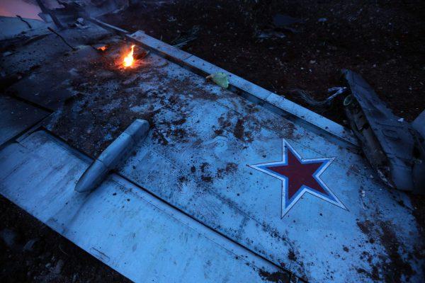 The wing of a downed Sukhoi-25 fighter jet in Syria's northwest province of Idlib on Feb. 3, 2018. (Omar Haj Kadour/AFP/Getty Images)