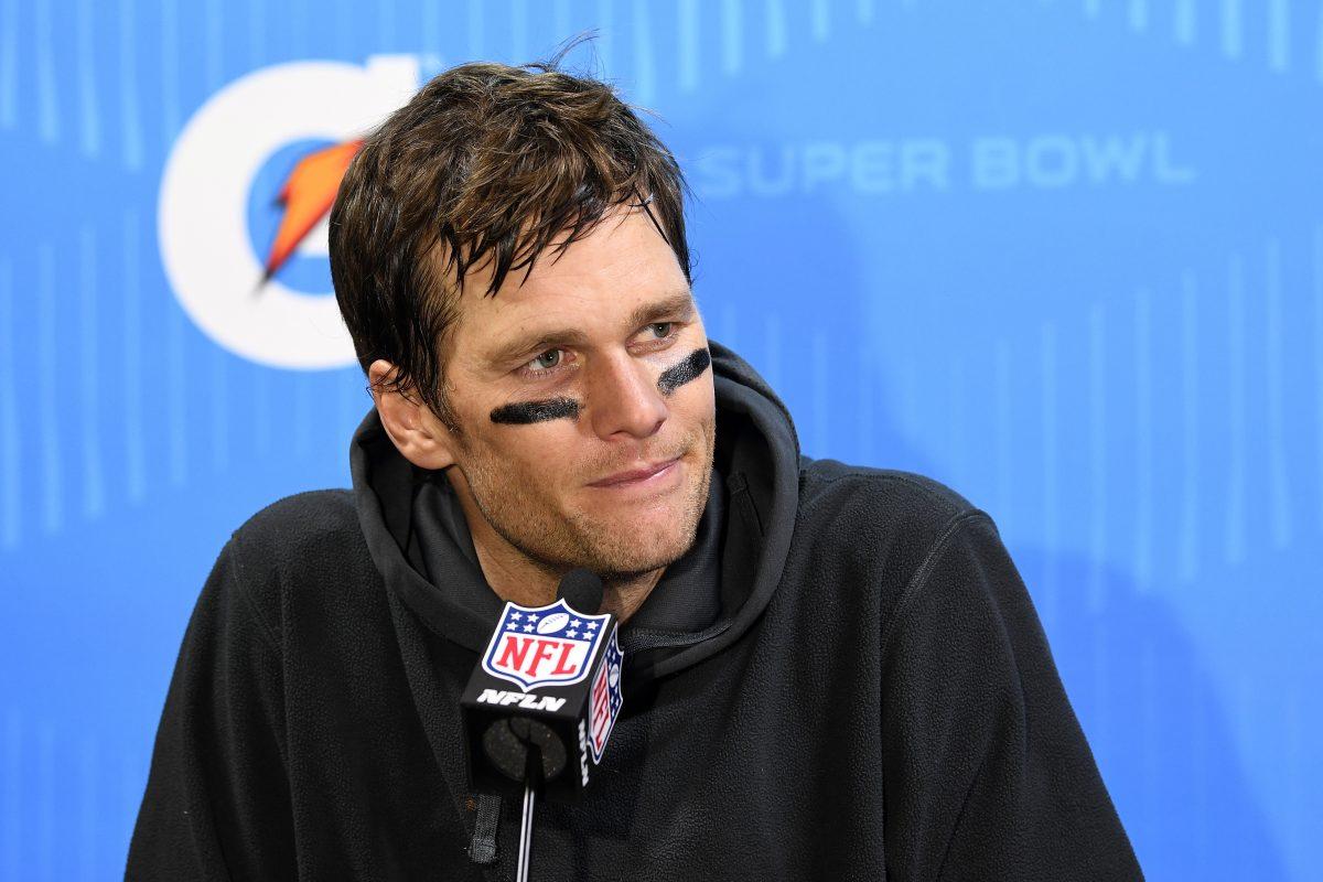 Tom Brady #12 of the New England Patriots speaks to the media after losing 41-33 to the Philadelphia Eagles in Super Bowl LII at U.S. Bank Stadium in Minneapolis, Minn., on Feb. 4, 2018. (Larry Busacca/Getty Images)