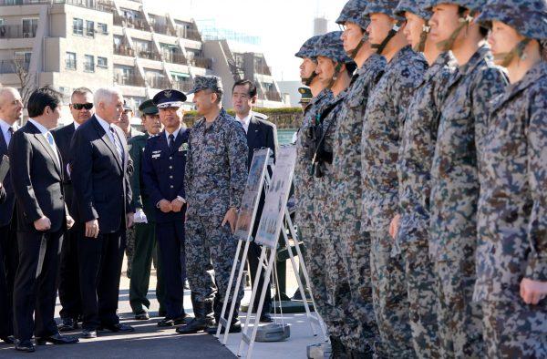 U.S. Vice President Mike Pence inspects with Japan's Defense Minister Itsunori Onodera in front of the PAC-3 surface to air interceptor at Defense Ministry in Tokyo, Japan Feb. 7, 2018. (Reuters/Shizuo Kambayashi/Pool)