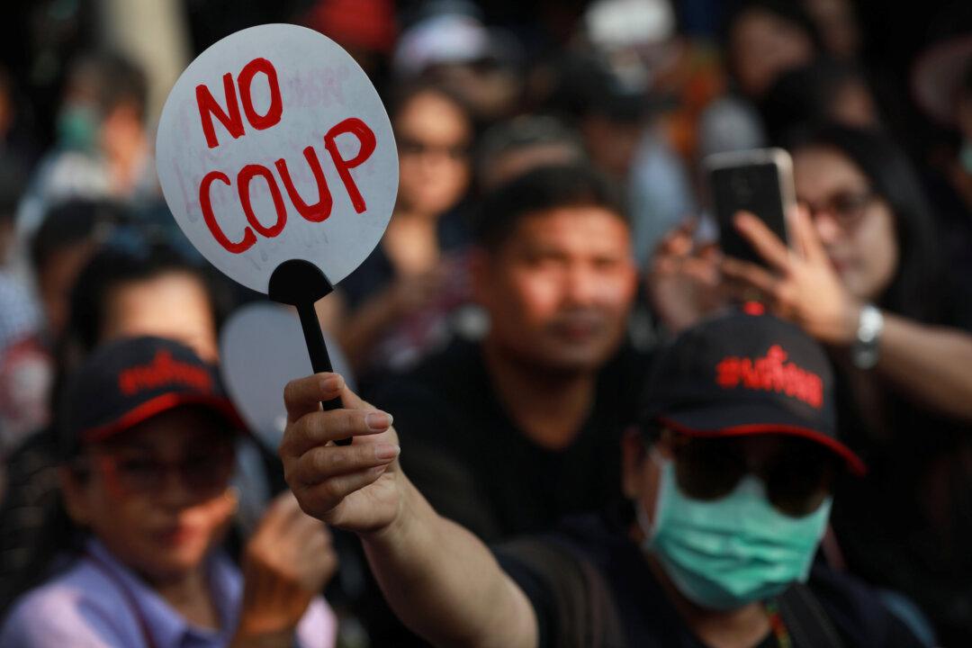 Hundreds Gather at Bangkok’s Democracy Monument to Demand Election