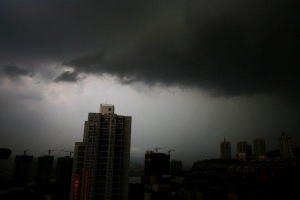 Clouds gather over the Chongqing skyline on August 23, 2007. (China Photos/Getty Images)