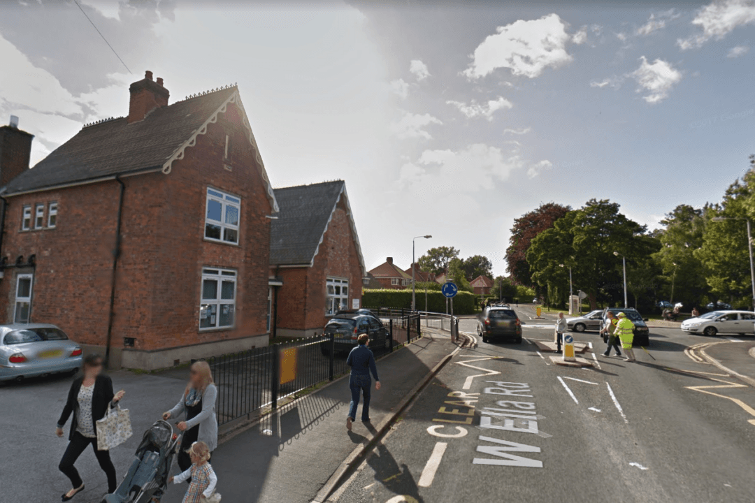 School Crossing Warden Told to Stop High-Fiving Children