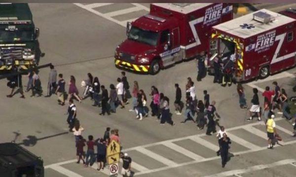 Students are evacuated from Marjory Stoneman Douglas High School during a shooting incident in a still image from video in Parkland, Florida, Feb. 14, 2018. (WSVN via Reuters)