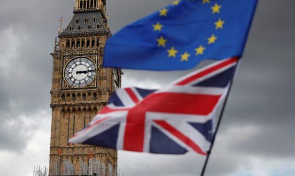 The Union Flag and a European Union flag fly near Big Ben bell in Parliament Square in central London, on Sept. 9, 2017. (Reuters/Tolga Akmen)