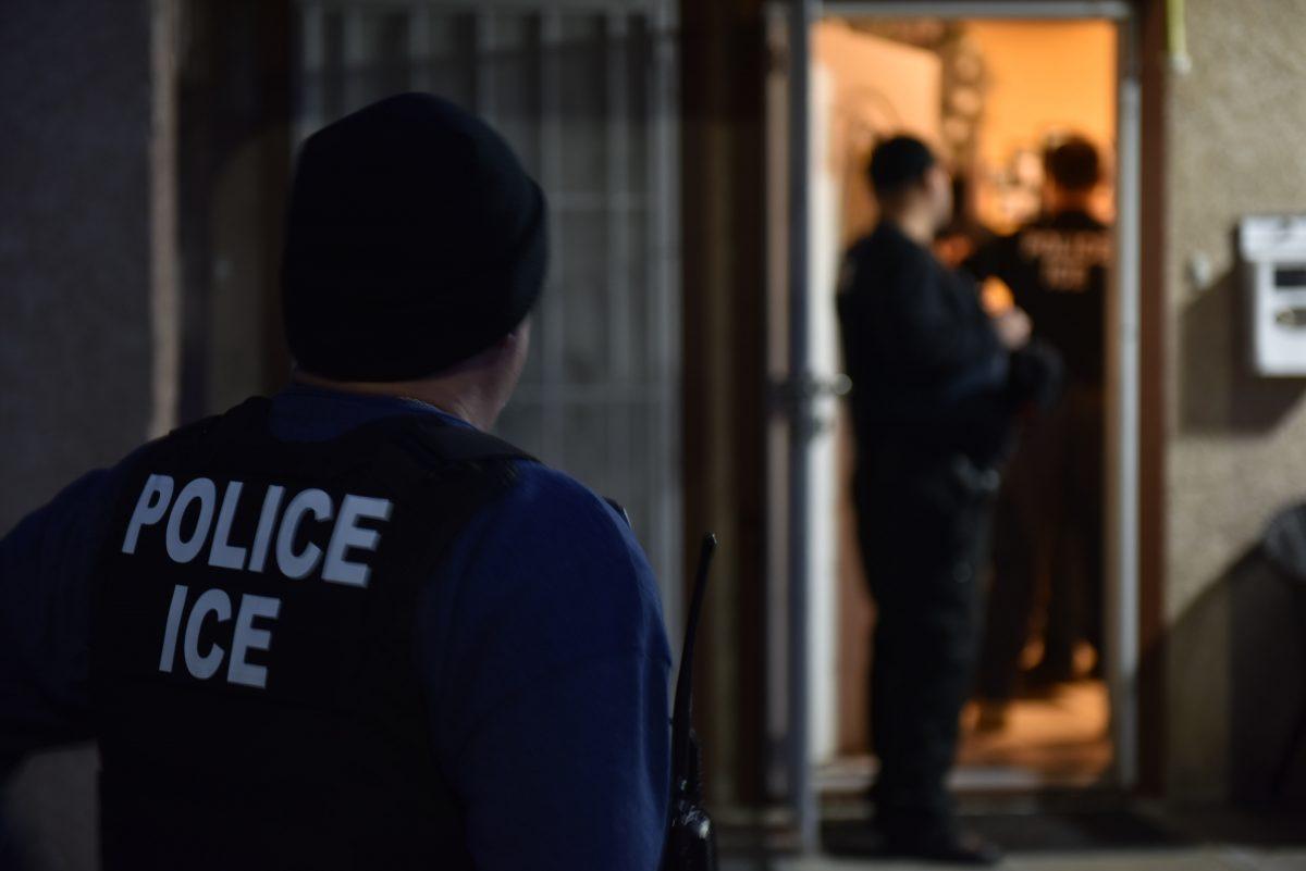 Immigration officers arrest illegal aliens during a targeted enforcement operation in Los Angeles, Calif., on Feb. 11, 2018. (ICE)
