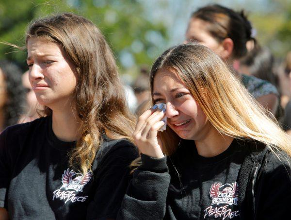 Students mourn during a community prayer vigil for victims of the previous day's shooting at nearby Marjory Stoneman Douglas High School in Parkland, at Parkridge Church in Pompano Beach, Fla., on Feb. 15, 2018. (Jonathan Drake/Reuters)