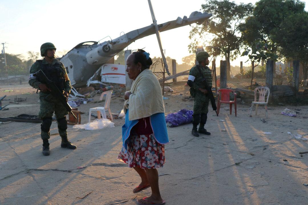 Mexico Helicopter Carrying Top Officials Crashes Killing 13 on Ground, Authorities Investigating
