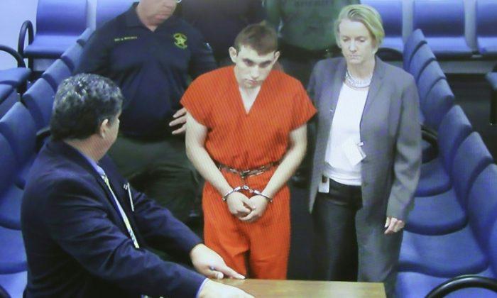 Couple Who Had Taken in Florida Gunman Say He Was Quirky, Naive